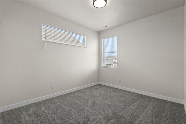 Building Photo - Spacious 4-Bedroom Home with Modern Comforts