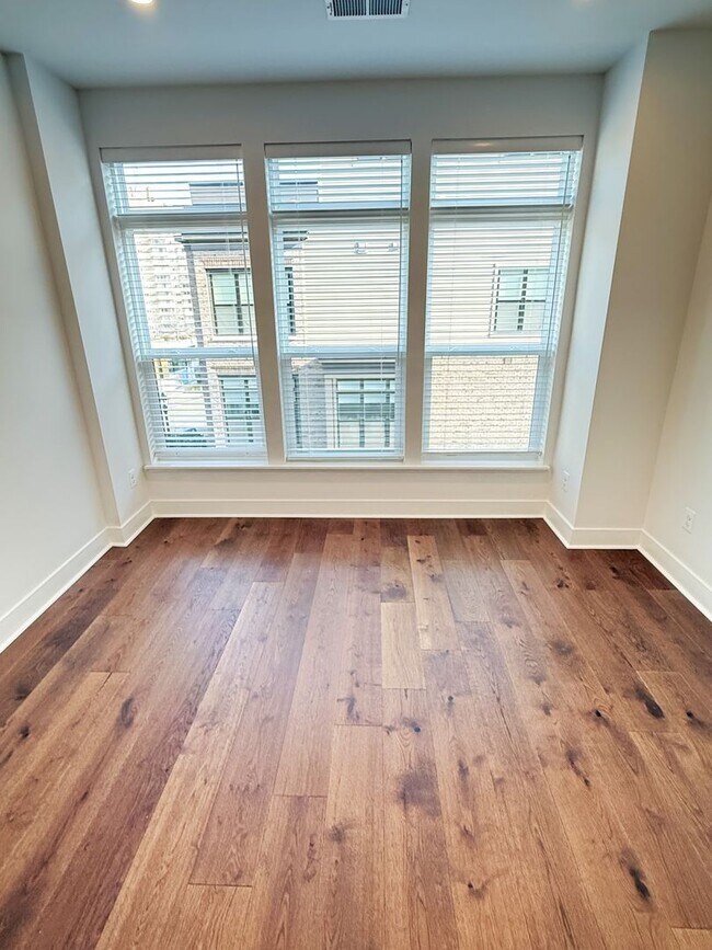 Building Photo - Brand new 4 level, 4 Bedroom Townhome with Elevator!