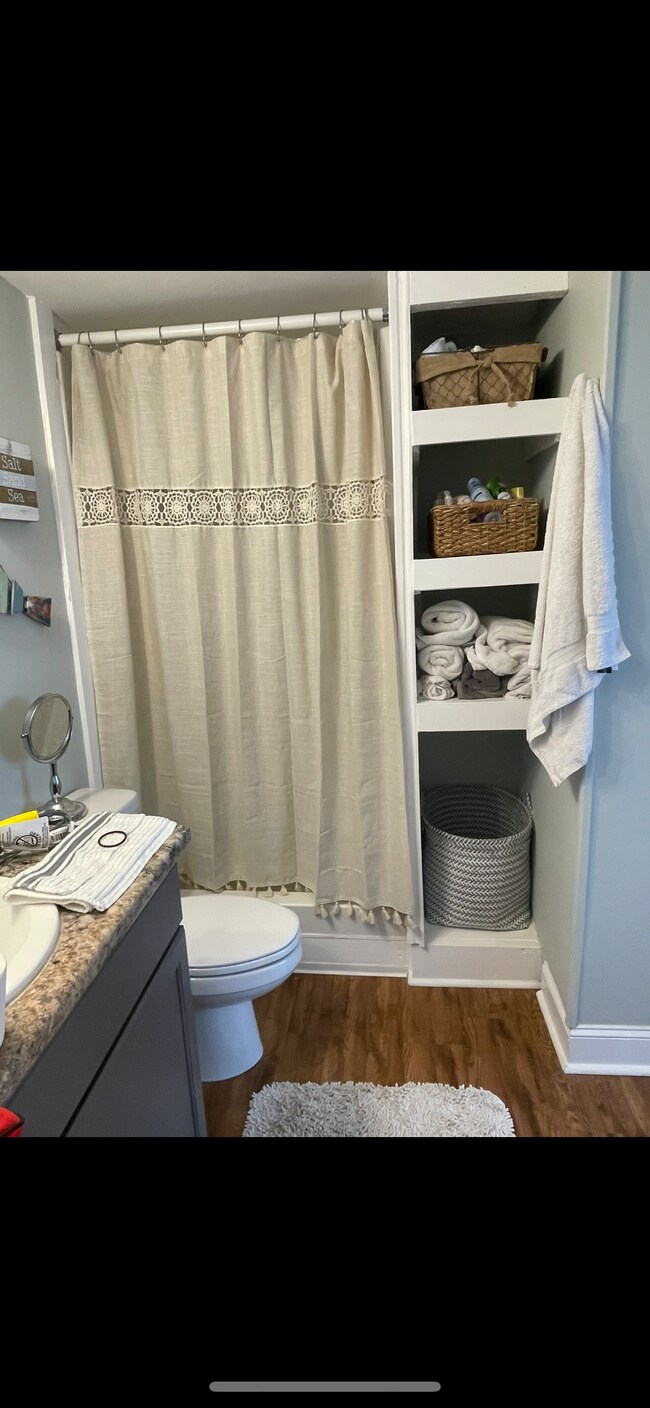 bathroom with storage shelves - 1100 Wheat St