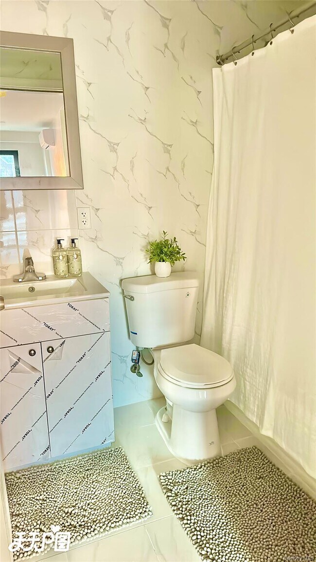 Building Photo - 70-25 Queens Blvd