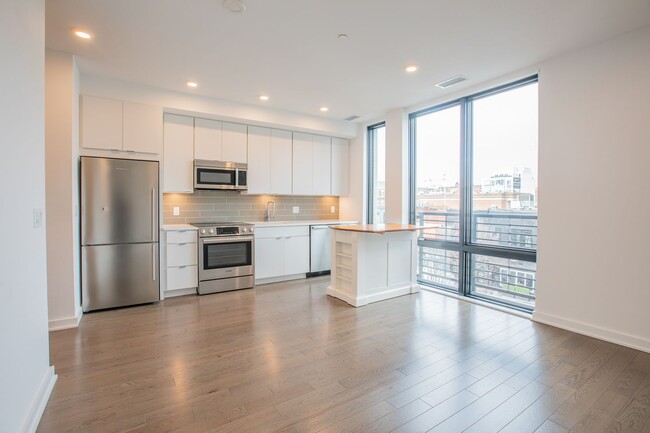 Building Photo - Stunning 1 Huge Den/1 Full BA Den Condo in...