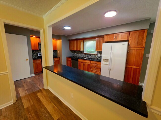 Building Photo - Nicely updated 3 bedroom, 2 bath home with 1-car garage