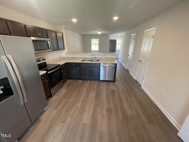 Building Photo - 2027 Wiggins Village Dr