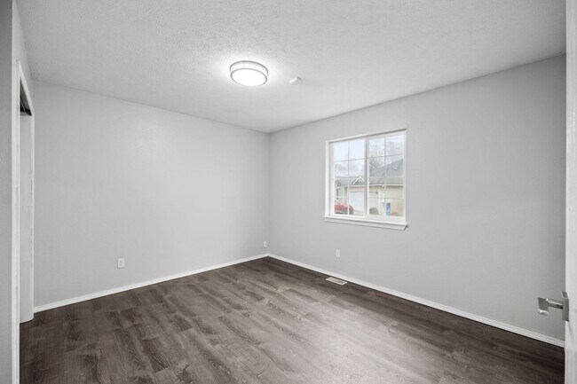 Building Photo - Spacious Latah Valley Home - Gated Community