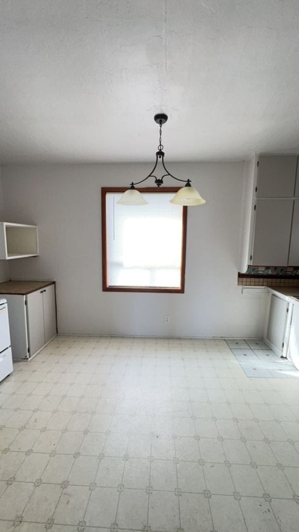 Building Photo - Charming 3-Bedroom Home with Backyard & Patio