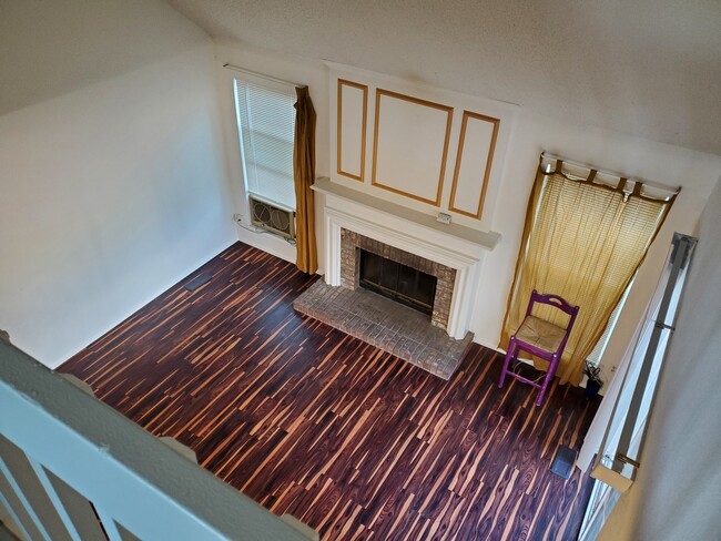 balcony view looking down to living room - 254 Greenway Cir W