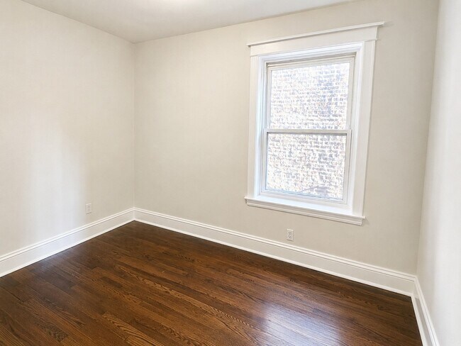 Building Photo - 7514 S Langley Ave