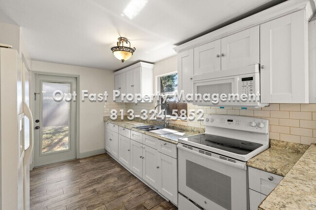 Building Photo - Private Yard Living with Recent Upgrades in Central Tampa