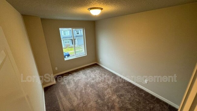 Building Photo - 5387 NW Torchcrest Pl