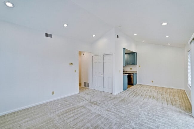 Building Photo - Spacious condo available in desirable Newpark Village community!