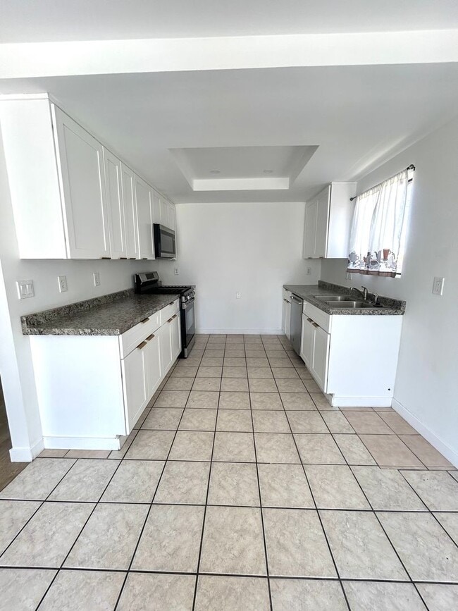 Building Photo - 6672 Mesquite Ave