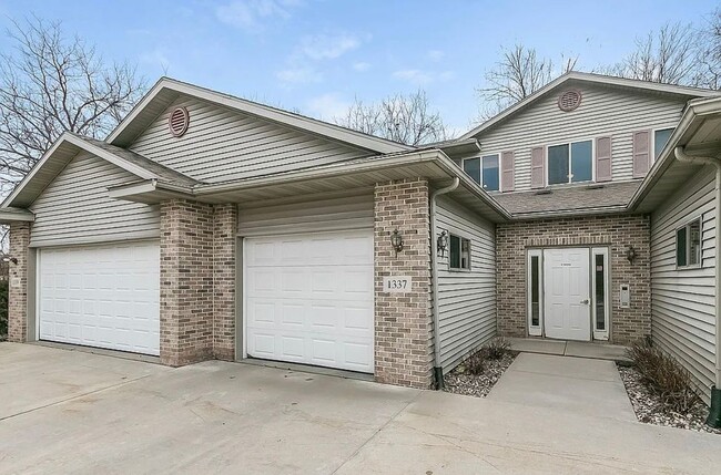 One car garage. Unit is part of a four-plex building. - 1337 Carpenter St