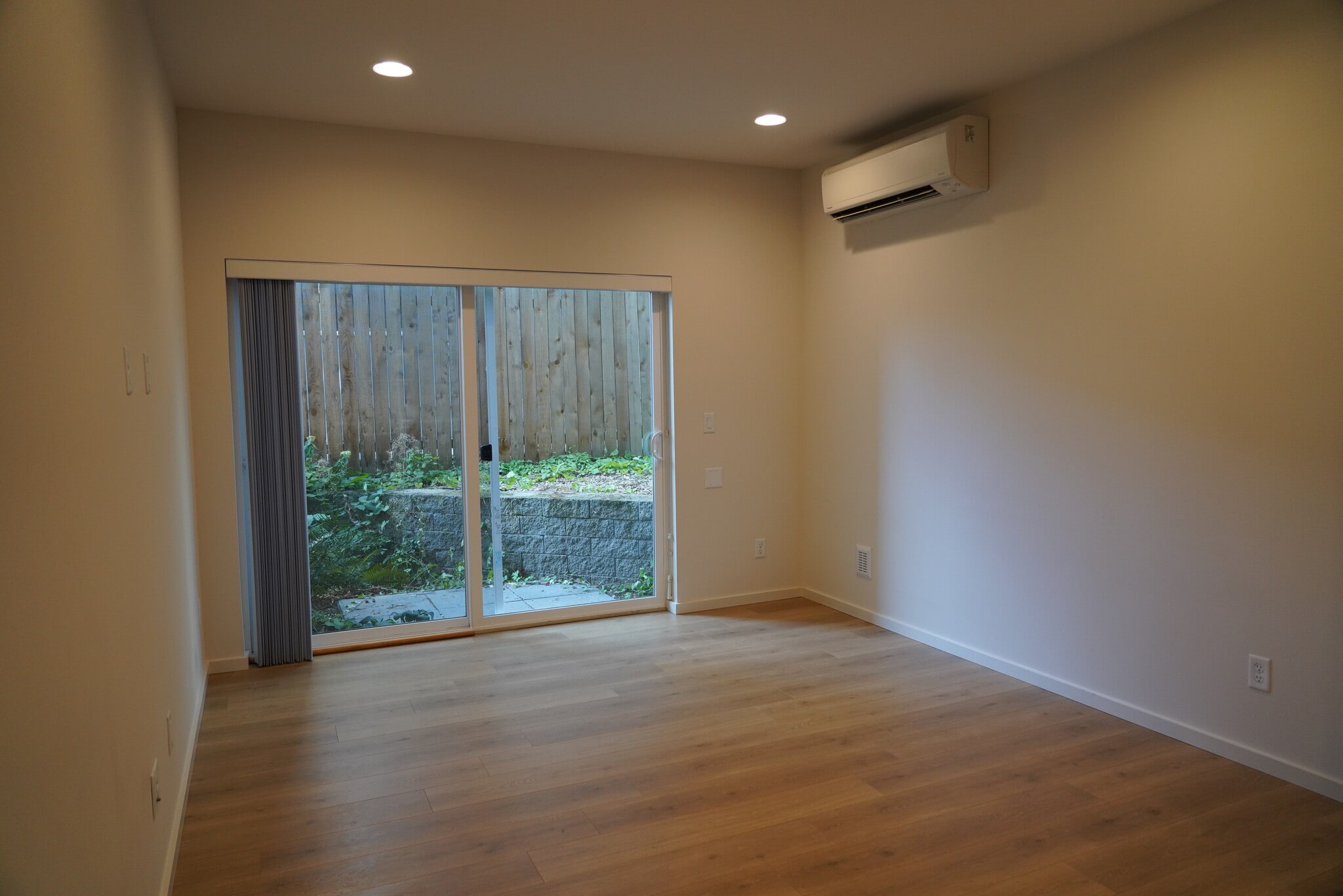 Living Room: Air Conditioning and back patio - 3631 1st Ave NW