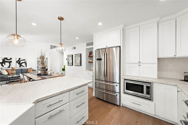 Building Photo - 12628 Newport Ave