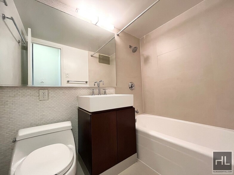 Building Photo - EAST 63 STREET / Spacious Sunlit 1-Bed 1-B...