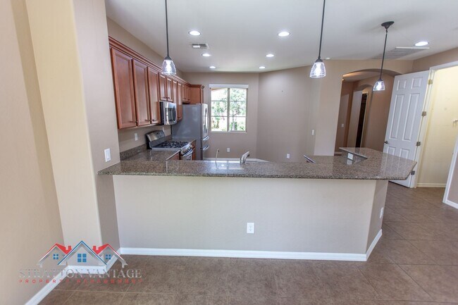 Building Photo - 4BR 2BA - Resort-Style Living in Ironwood Crossing – Heated Pool, Designer Finishes & Flexible Li...