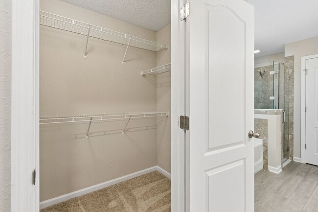 Building Photo - Modern 4BR Home with 3 Full Baths in River Glen | Screened Porch & Resort-Style Amenities