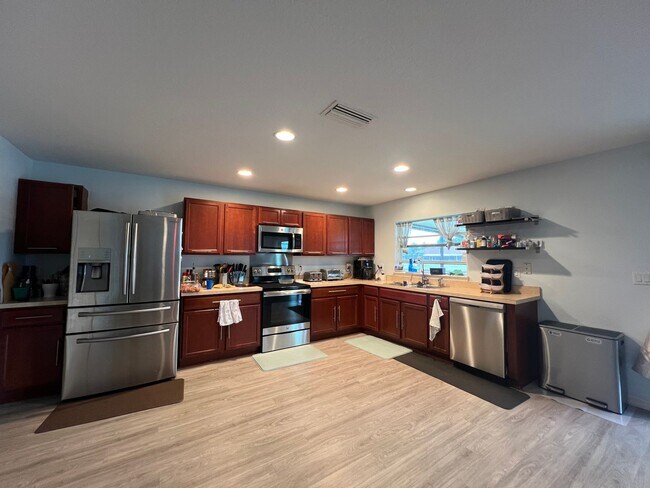 Building Photo - Updated 4 Bedroom, 3 1/2-bathroom home