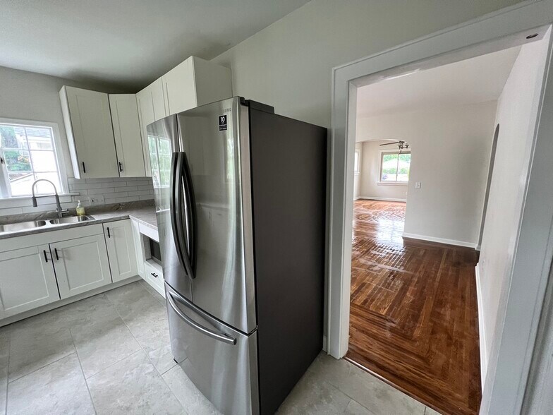 View from Kitchen to dining & living - 6816 Park Ave