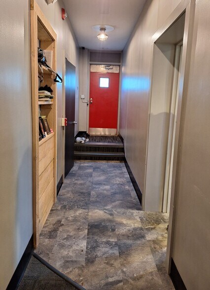 Apartment Hallway Entrance with Built In Cabinet - 208 W Broadway St