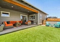 Building Photo - Furnished monthly rental, modern style home with abundant light, garage, backyard. 30-day Min.