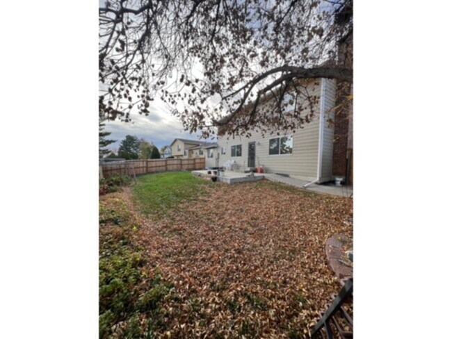 Building Photo - 9941 W Layton Ave
