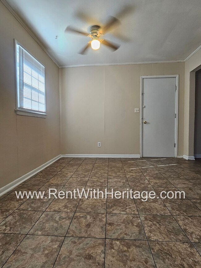 Building Photo - Great Brick Ranch / Harwood Floors / Huge Shop or Extra Storage / No Garage / Great Private Back ...