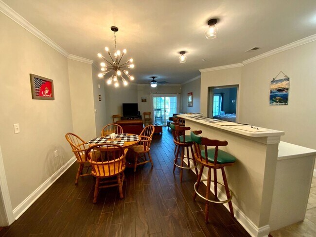 Building Photo - Furnished 3 bedroom 3 bath Condo - Flexible Term lease - Topsail Landing Community