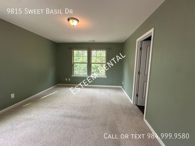 Building Photo - 9815 Sweet Basil Dr