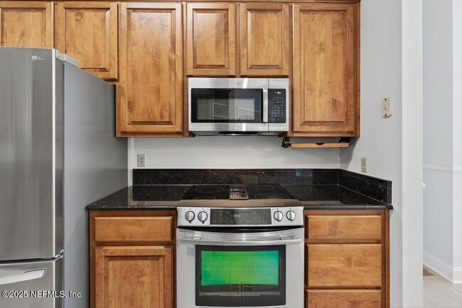 Building Photo - 4851 Jaybird Cir N