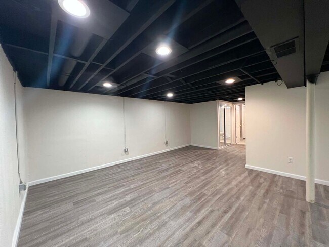 Building Photo - Spacious 4-Bedroom Home with Finished Basement & Attached Garage