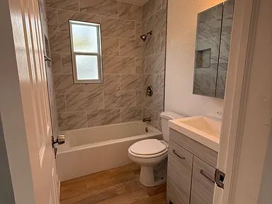 Building Photo - Charming Centrally Located Home | Wood Floors + Fenced Yard