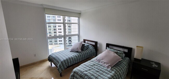 Building Photo - 19111 Collins Ave