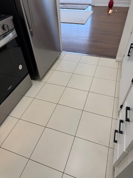 Kitchen tile flooring - 518 1/2 Crane Blvd