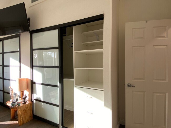 Building Photo - Stunning 3-bedroom, 2-bathroom coastal condo with Modern Custom Upgrades!