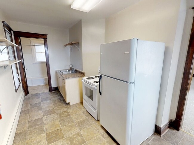 Building Photo - 5018 Tioga St