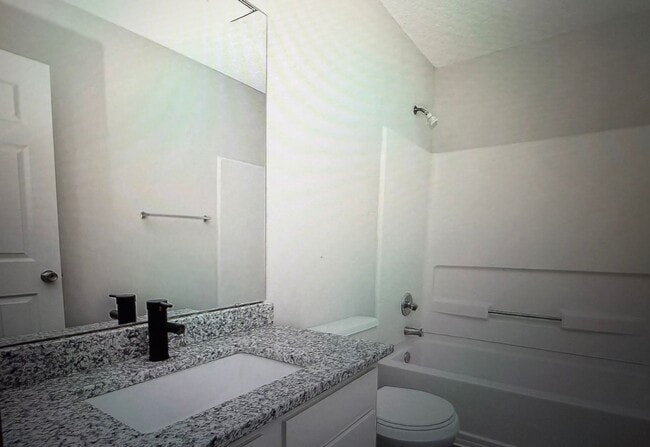 Building Photo - Coming Soon, Completely Renovated 2 Bedroom Townhome