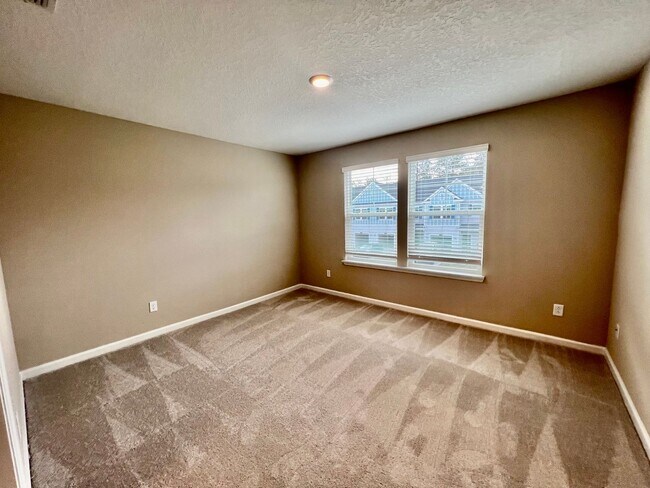 Building Photo - Lagoon Life + Luxury Living in St. Johns County - Beachwalk Townhome on the water!