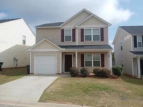 Building Photo - 4 Bedrooms 2.5 Bathrooms