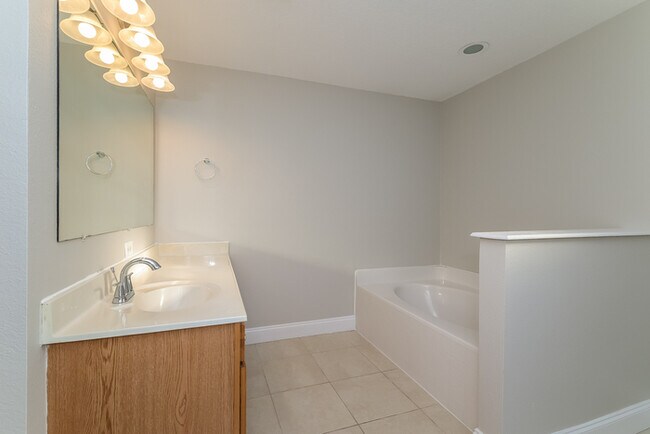 Building Photo - Spacious Comfort Meets Modern Touches