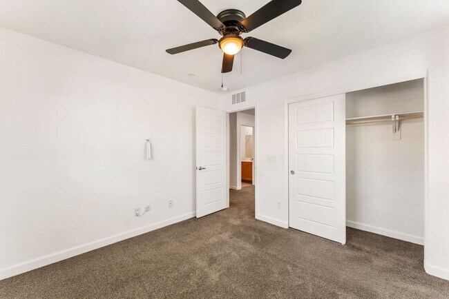 Building Photo - Modern Gated Townhome Living with Resort-Style Community Amenities