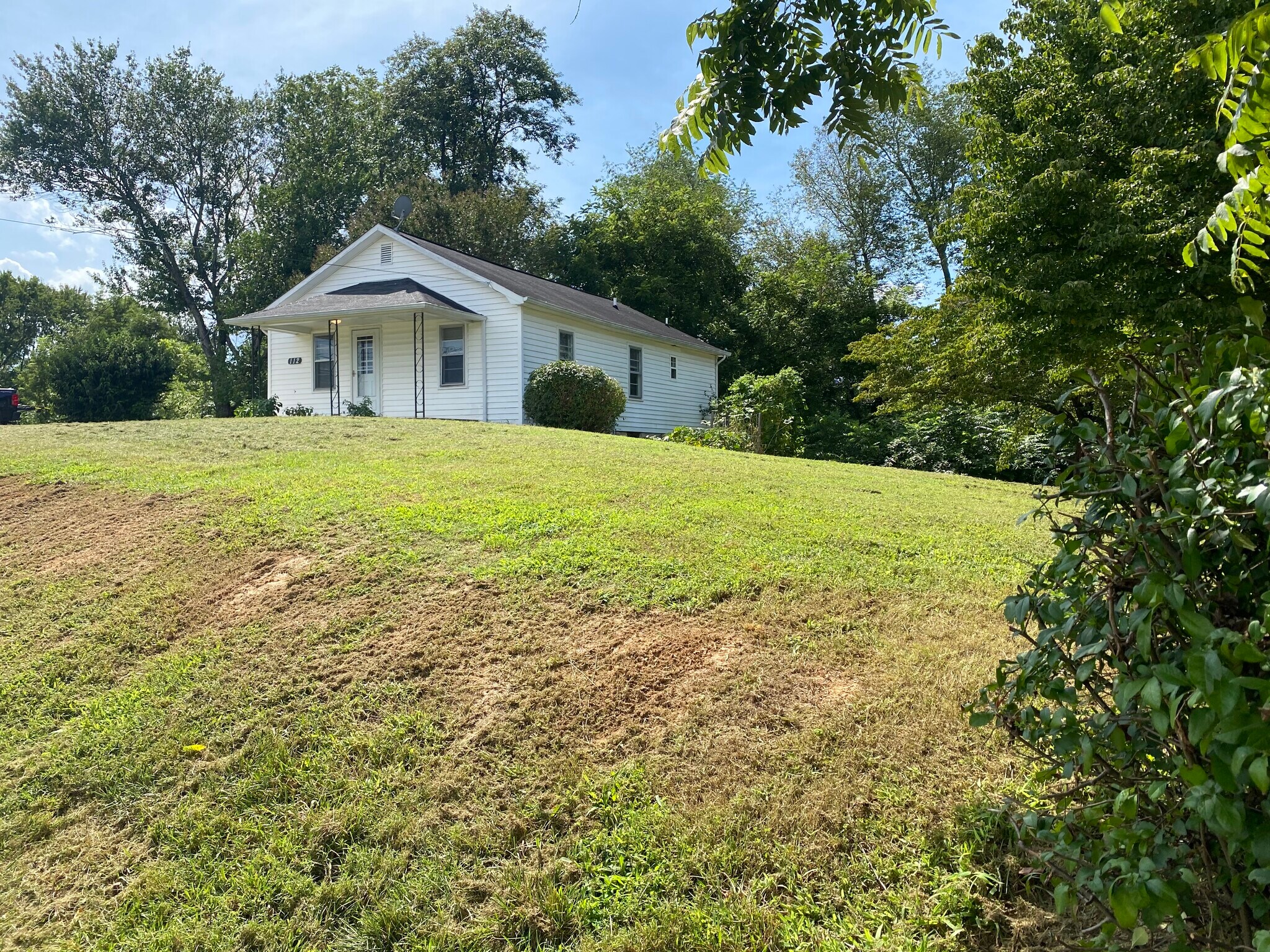 Front of 112 Holland Dr across from Jamestown Flea Market - Cover Front Porch - 112 Holland Dr