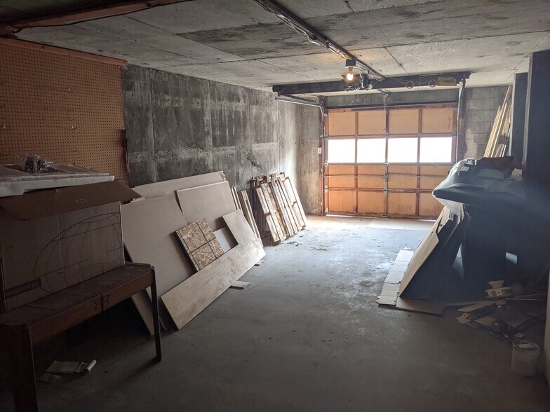 Deep garage. Parking in driveway. - 630 West Main St