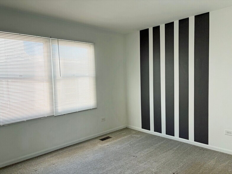 Bedroom 1, stripes are dark gray - 241 E Palatine Rd