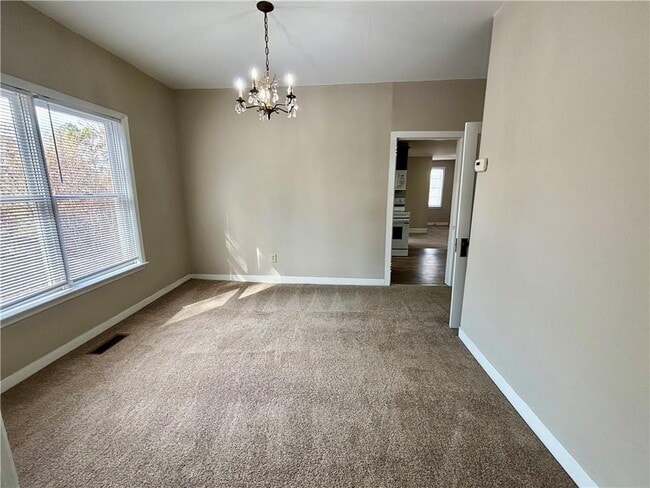 Building Photo - 3302 N Bogan Rd NE