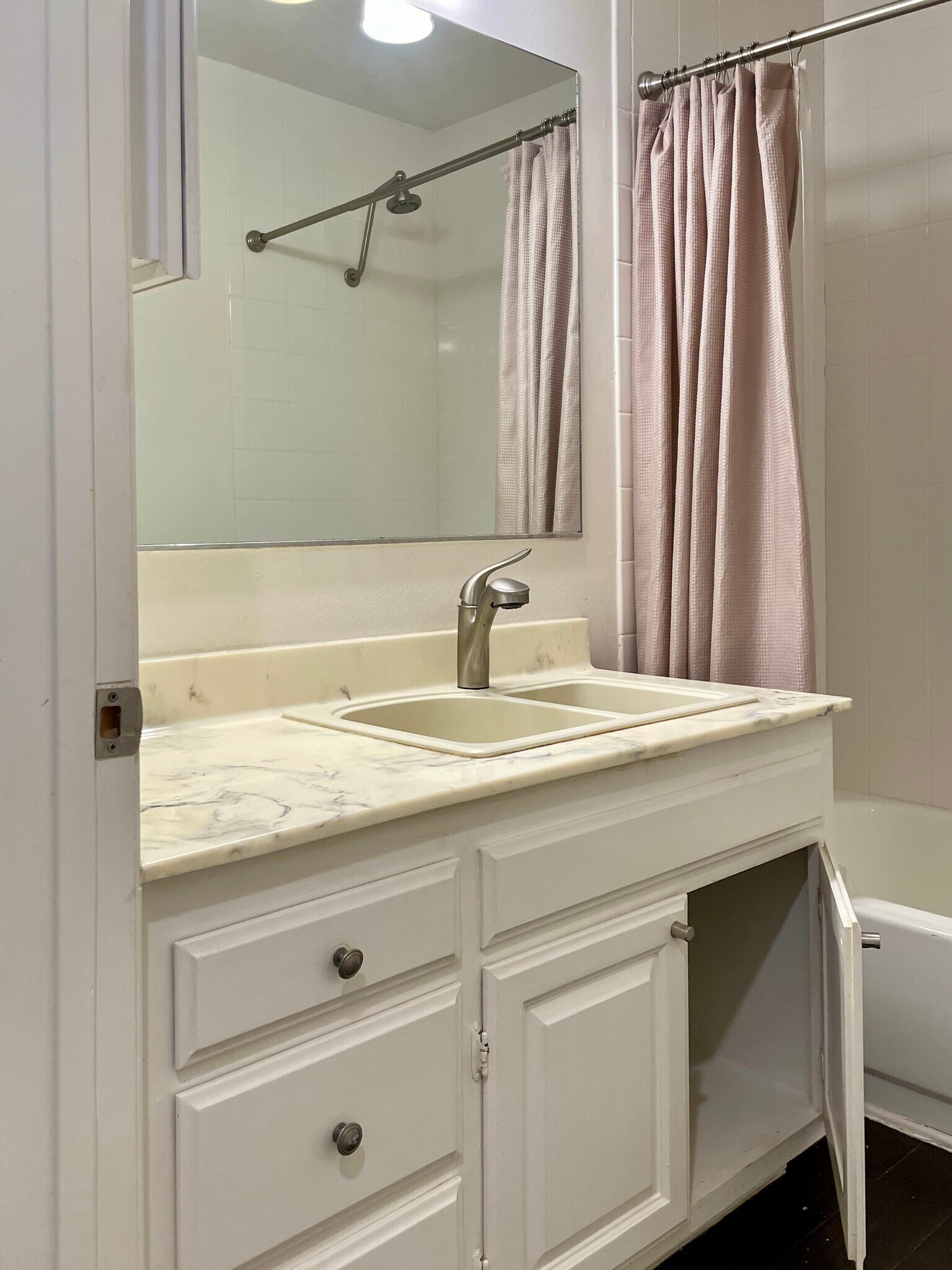 Bathroom sink and cabinet - 22506 Quinta Rd