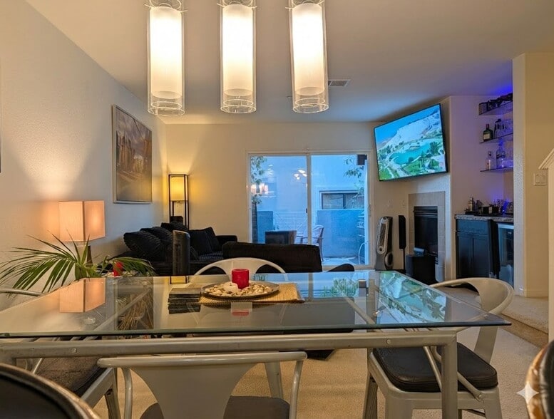 View of dining area facing living room and balcony - 3542 Shoreline Bluff Lane