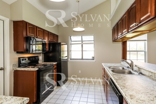 Building Photo - The living is easy in this 4 bedroom, 2 bathroom home