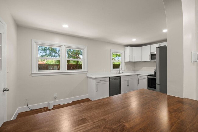 Building Photo - Spacious Split-Level Living with Dual Fireplaces & Expansive Deck