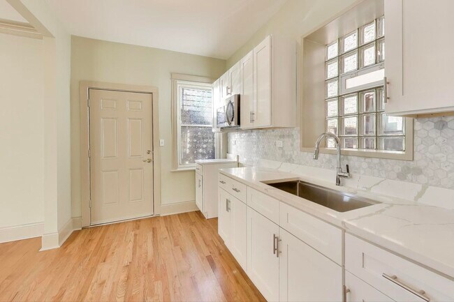 Building Photo - 6146 S Evans Ave